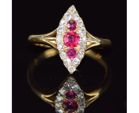 Edwardian 18ct gold ring set with rubies and old cut diamonds in a marquise shaped setting, Birmingham 1902, 2.4g, size L