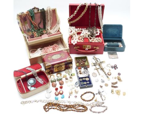 A collection of costume jewellery including Arts &amp; Crafts brooch, mother of pearl rosary beads with white metal crucifix,