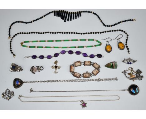A collection of silver jewellery including Arts &amp; Crafts pendant set with opals, amethyst bracelet, Charley silver pendan