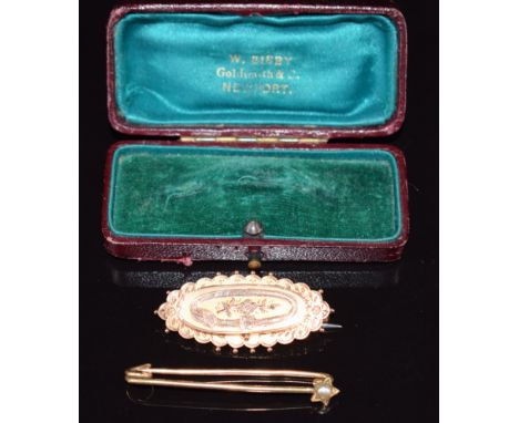 Edwardian 9ct gold brooch with floral and buckle decoration, in original box, and a 9ct gold pin set with a split pearl, 5g