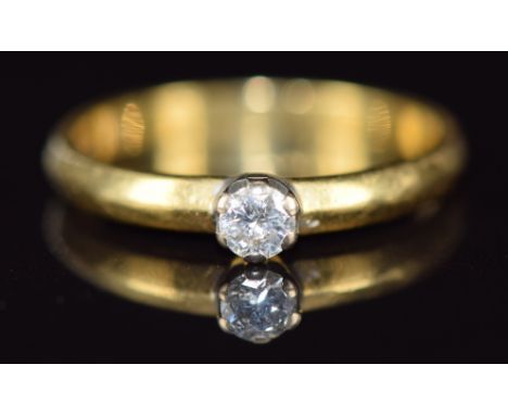 An 18ct gold ring set with a diamond of approximately 0.15ct, 2.5g, size L