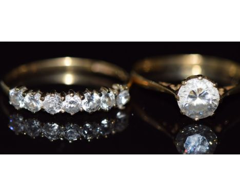 Two 9ct gold rings set with cubic zirconia, 2.3g, size K &amp; M