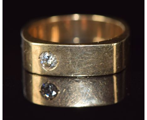 A 9ct gold ring set with a diamond, 8.1g, size R