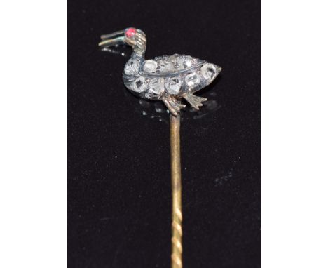 Victorian stick pin in the form of a duck set with rose cut diamonds and ruby eye, 6.5cm