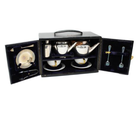 Vintage Asprey of London Traveling Tea Set. 1905 traveling tea service retailed through Asprey of London. Contents housed in 