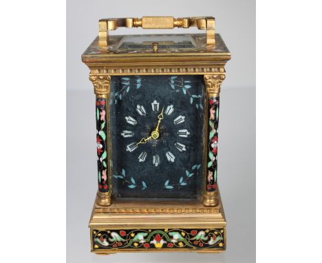French Bronze/Champleve Carriage Clock. With scrolling foliate enameled champleve design throughout exterior. Height: 6 in.