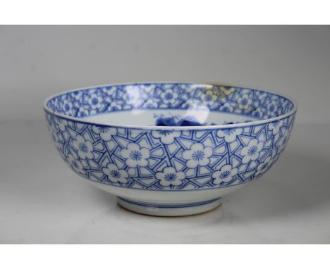 Chinese Blue and White Porcelain Bowl, Marked on Bottom. Wax seal on bottom of bowl. Diameter: 9.5 in.