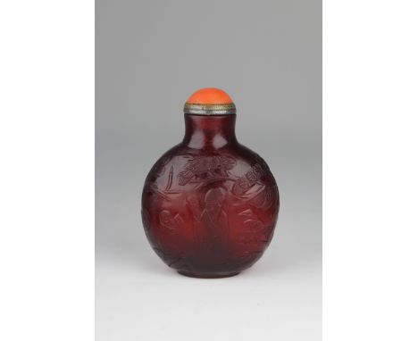 19th C. Chinese Ruby Red Glass Snuff Bottle. Circa 1750-1820. The compressed globular bottle rested on an oval foot ring, one