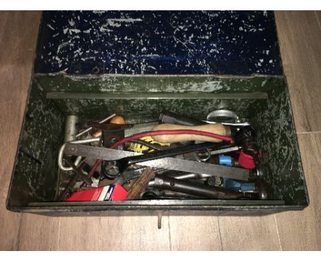 A VINTAGE METAL TOOLBOX WITH CONTENTS