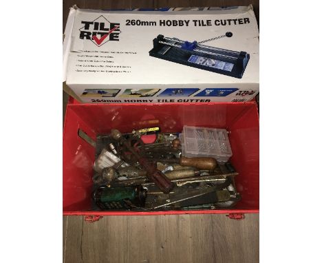 A TOOLBOX WITH CONTENTS AND TILE CUTTER