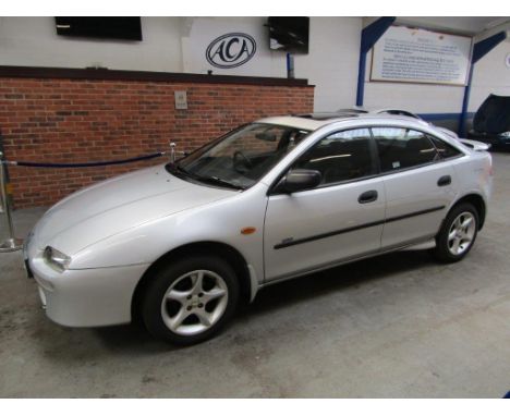 Make &amp; Model: Mazda 323 ImolaDate of Reg: R235 DVWColour: Silvercc: 1489MoT: 30-06-2022Fuel Type: PETROLMileage: 56kTrans