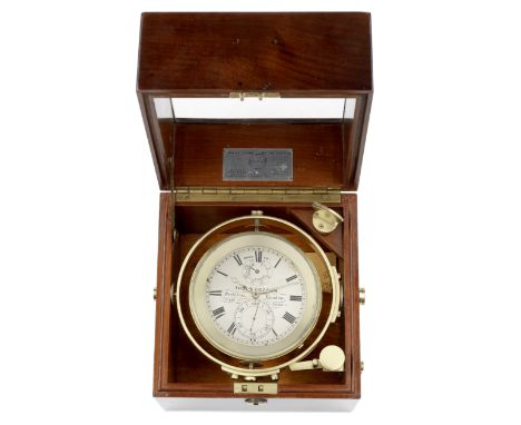 Thos Cogdon. A brass cased marine chronometer gimbal mounted in a wooden deck boxDate: Circa 1890Movement: Full plate gilt, b