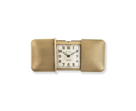 Movado. A 9K gold manual wind purse watchModel: EmertoDate: Circa 1960Movement: Jewelled manual windDial: Silvered, luminous 