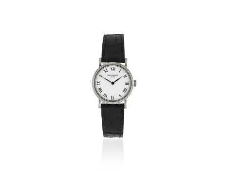 Patek Philippe. A lady's 18K white gold manual wind wristwatchModel: CalatravaReference: 4809G-001Date: Purchased 30th Octobe