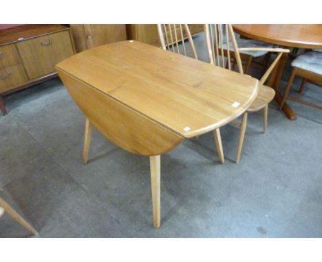 An Ercol Blonde elm and beech Windsor drop-leaf table 