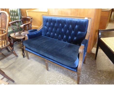 A French carved beech and blue fabric upholstered canape settee 