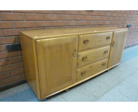 An Ercol Blonde elm Windsor sideboard 