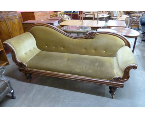 A Regency mahogany and green fabric upholstered scroll end settee 