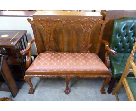 A Chippendale Revival carved mahogany salon settee 