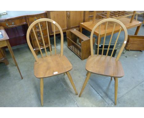 A pair of Ercol Blonde elm and beech Windsor chairs 