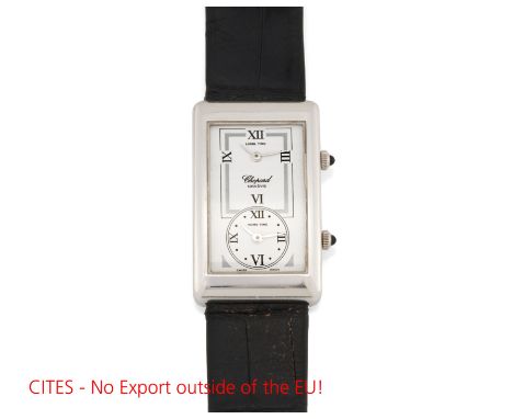 CHOPARDDual Time. Armbanduhr. Herkunft: Schweiz, Genf. Werk: Quarz. Gehäuse/Armband: 750/- Weißgold, schwarzes Lederarmband m