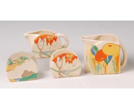 A Clarice Cliff Delecia pattern Bonjour shaped cream jug, black printed backstamps and further hand-painted number 23356 vers