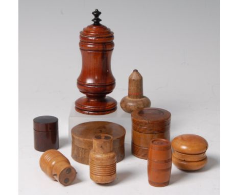 An early 19th century treen spice jar, the cover with ebonised finial to a turned waisted body, h. 13cm, together with variou