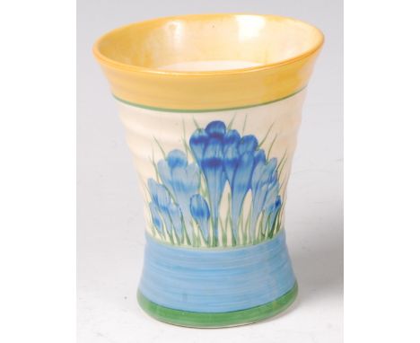 A Clarice Cliff small Crocus pattern pottery vase, shape No.572, of circular ribbed waisted form, black printed backstamp 'Cr