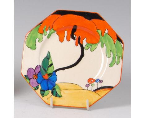 A Clarice Cliff Woodland pattern pottery octagonal side plate, bright colour decorated, black printed backstamps and indistin