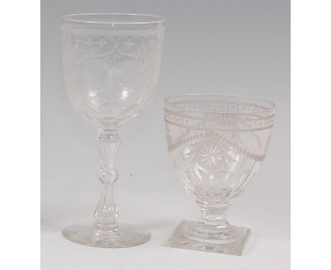 A 19th century pedestal glass goblet, the bowl engraved with bird supporting swags of flowers, within further C-scrolls (chip