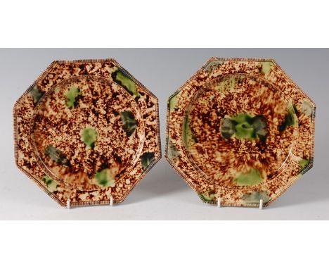 A pair of 18th century Whieldon type octagonal plates, each having green and brown mottled decoration and ribbed edges, circa