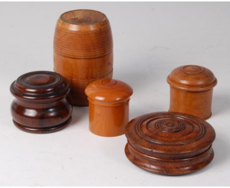 A 19th century turned oak pocket snuff-box, of circular form, dia.9cm, together with a fruitwood jar and cover of barrel form