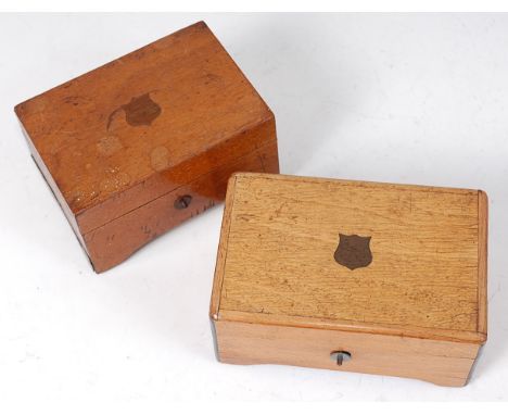 A late 19th century Swiss oak cased music box, the 6cm cylinder playing three airs, 13.5cm; and one other similar smaller exa