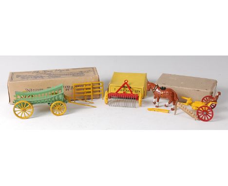 A collection of diecast and lead hollowcast farming figures, to include; a Charbens model farm wagon with green and yellow ca