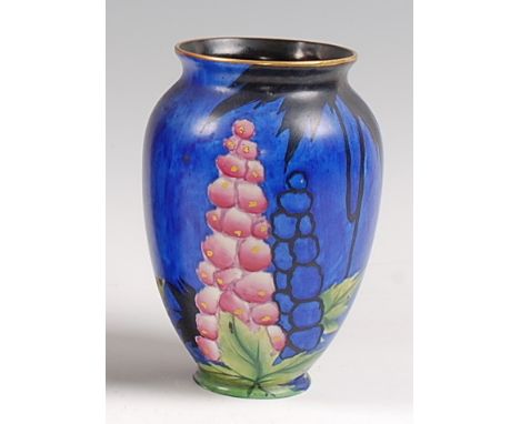 A Carltonware Handcraft vase, of baluster form, decorated in the Hollihock design on a blue ground, printed backstamp and fur