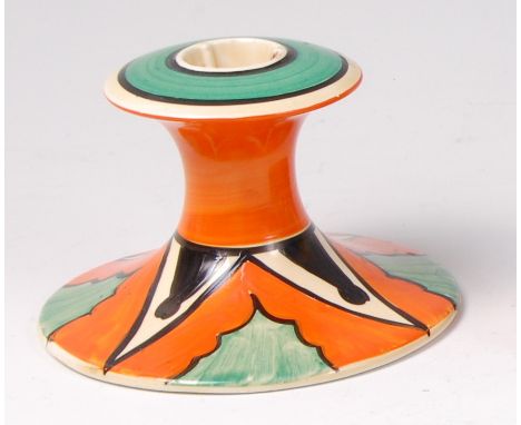 A Clarice Cliff Keyhole pattern pottery candlestick, shape No.310, black printed backstamp verso, h.7.8cm   Condition Report 