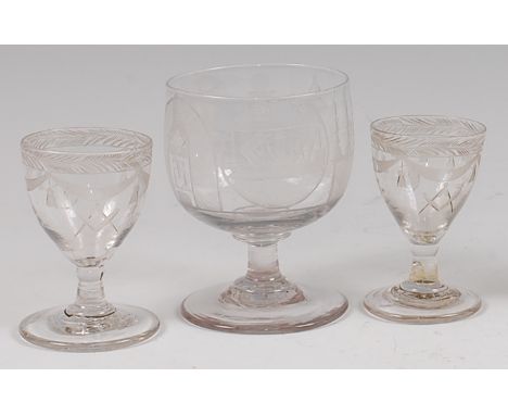 A 19th century Masonic pedestal goblet, engraved with Masonic symbols, h.11.5cm; together with a pair of smaller Masonic gobl