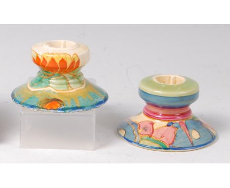 A Clarice Cliff Delecia pattern pottery squat candlestick, shape No.331, with black printed backstamp, raised shape number, a