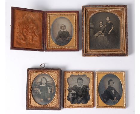 Five various 19th century portrait ambrotypes, each in brass and leather mounts, sitters and photographers all unknown, the l