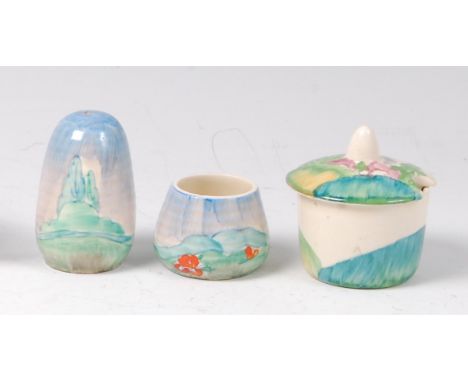 A Clarice Cliff Forest Glen pattern pottery table salt, of ovoid form, with partial cork stopper, h.6.5cm; together with a ma