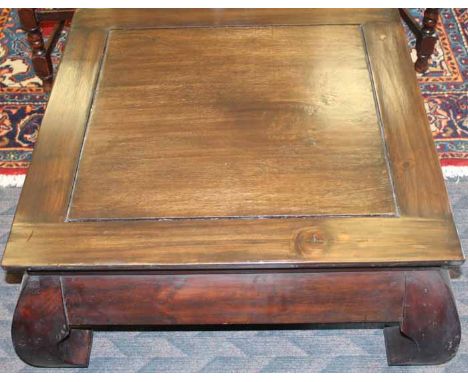 MODERN MALAY MAHOGANY COFFEE TABLE
with square top and of squat form, 39cm high, 74cm square
Light surface marks and scuffs. 