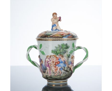 NAPLES 'CAPODIMONTE' PORCELAIN CUP AND COVER
modelled con basso relievo istoriato with a band of classical subjects including