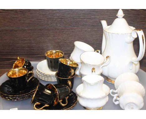 ROYAL ALBERT BONE CHINA VAL D'OR SIX PLACE TEA SET
gilt rims on ivory ground, six cups, six saucers, milk, sugar and teapot; 