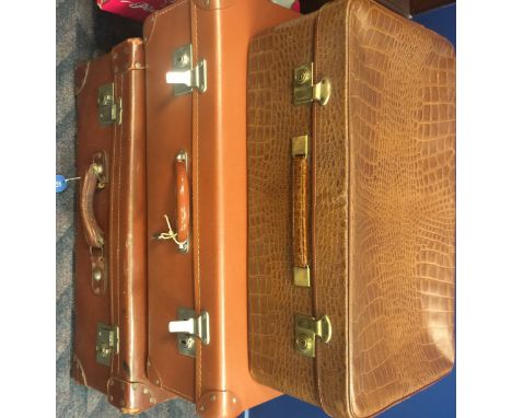 COLLECTION OF THREE VINTAGE SUITCASES including a faux-crocodile effect suitcase, the largest 44cm high, 64cm long
