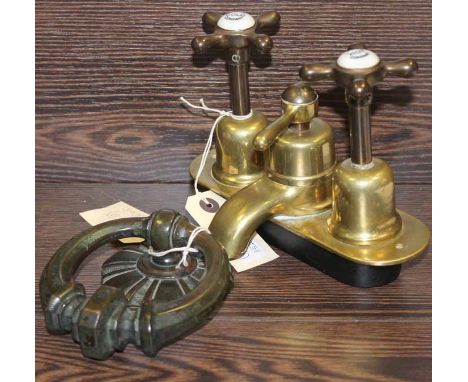 VICTORIAN BRASS BATH MIXER TAP
along with a Victorian brass door knocker, the tap 15cm high, both in fair condition