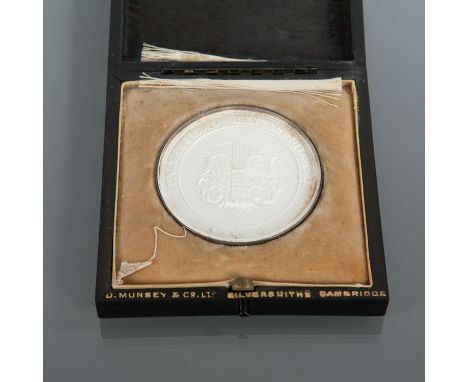 'UNIVERSITAS CANTABRIGIENSIS' MEDAL
in white metal, displaying the Cambridge University coat of arms to one side, and an imag
