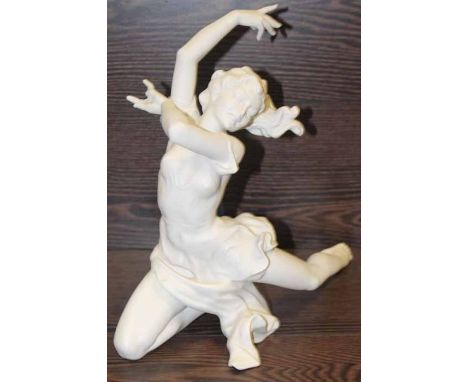 GERMAN HUTSCHENREUTHER BISQUE FIGURE OF A FEMALE DANCER depicted mid-dance and kneeling on one knee with raised arms, impress