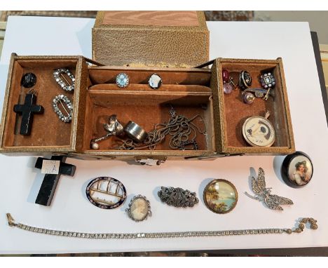 A vintage 2 tier jewellery box with contends including diamante necklace, enamel buckle, 2 Marcasite brooches, other vintage 