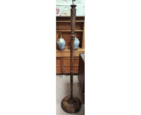 An oak turned standard lamp and two mirrors 