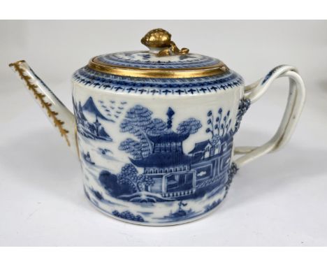 A Chinese export blue and white teapot with over twisted handle, gilt and blue and white decoration (chip to rim), length 24c